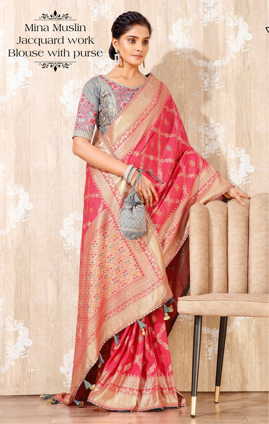 Brick Red Colour Mina Muslin Saree With Jacquard Work Blouse And Purse